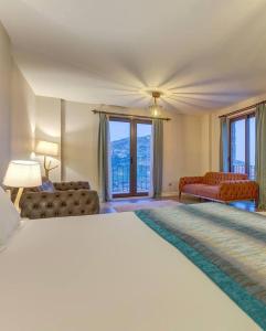Postel nebo postele na pokoji v ubytování Mesken otel