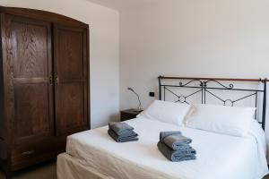 Voodi või voodid majutusasutuse Al Borgo toas