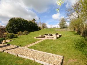 a park with a bench in a grass field at 2 bed in Duns 48811 in Duns