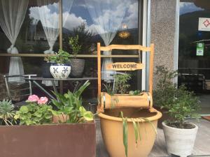 Zahrada ubytování Khamsum Inn