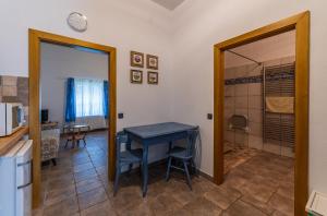 Kuchyň nebo kuchyňský kout v ubytování Apartmány Modrá Vrata