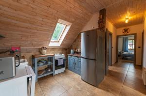 Kuchyň nebo kuchyňský kout v ubytování Apartmány Modrá Vrata