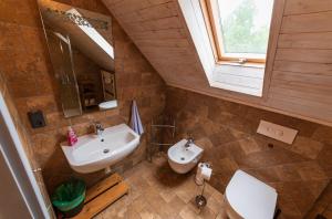 Koupelna v ubytování Apartmány Modrá Vrata + 37 fotografií