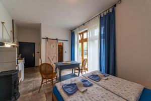 Postel nebo postele na pokoji v ubytování Apartmány Modrá Vrata
