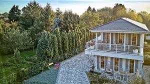 an aerial view of a house with a porch at The Doors Luxury Apartment in Mosonmagyaróvár