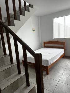 Postel nebo postele na pokoji v ubytování YOLO House Peru