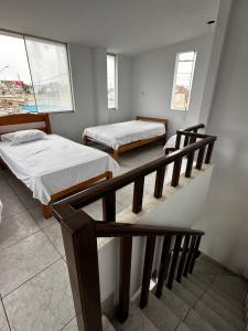 Postel nebo postele na pokoji v ubytování YOLO House Peru