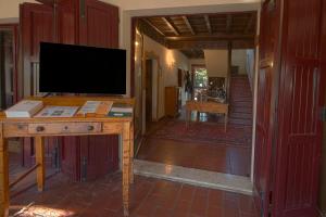 A television and/or entertainment centre at Villa Belfiore
