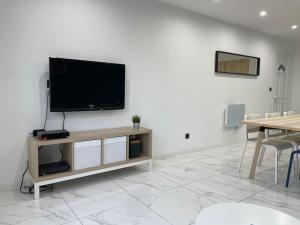 TV a/nebo společenská místnost v ubytování Superbe T4 Spacieux et Lumineux IUT-Hôpital-Stade