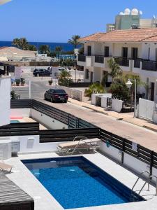 a view of a swimming pool from a building at Villa Thalassa Polyxenia in Protaras