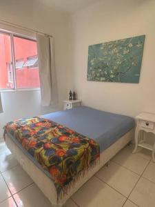 Postel nebo postele na pokoji v ubytování Ape Caiobá