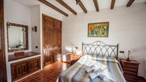 Posteľ alebo postele v izbe v ubytovaní Casa Rosario Almachar by Ruralidays