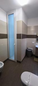 a bathroom with a toilet and a sink at Alba b&b in Polignano a Mare