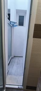 a door leading into a room with a hallway at Alba b&b in Polignano a Mare