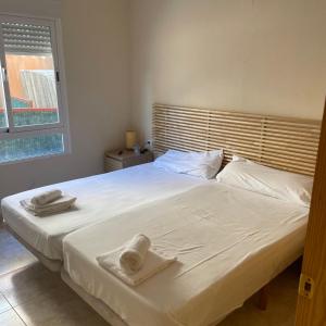 Postel nebo postele na pokoji v ubytování Hotel Algorfa