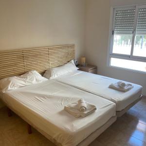 Postel nebo postele na pokoji v ubytování Hotel Algorfa