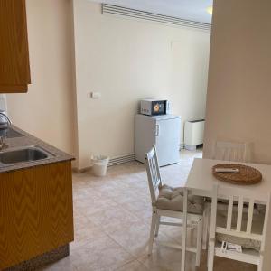 Kuchyň nebo kuchyňský kout v ubytování Hotel Algorfa