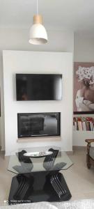 TV a/nebo společenská místnost v ubytování Villa Faihs