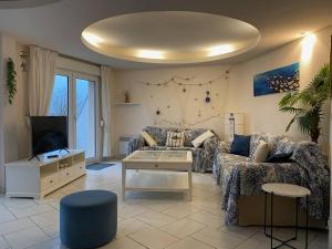 Χώρος καθιστικού στο Superbe appartement duplex au centre de TREGASTEL vue sur mer - Réf 745