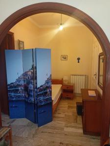 Postel nebo postele na pokoji v ubytování Four view house in Kalymnos Κάθε μπαλκόνι έχει άλλη θέα
