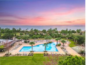 an aerial view of a pool at a resort at Coastal Dreaming - Beach Retreat in Saint Joe Beach