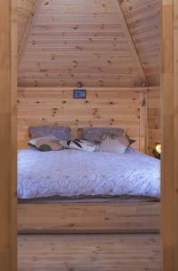 Postel nebo postele na pokoji v ubytování Gîte Le Refuge Nordique