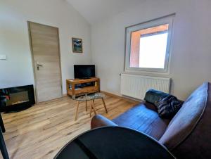 Χώρος καθιστικού στο Le Renard des Vosges