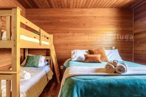 Postel nebo postele na pokoji v ubytování Villa dos Plátanos em Rancho Queimado