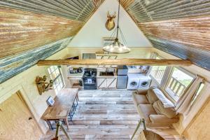 an overhead view of a tiny house kitchen and living room at Waterfront Marksville Studio with Dock! in Marksville