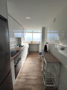 A cozinha ou cozinha compacta de Apartamento Málaga 300 metros de la playa