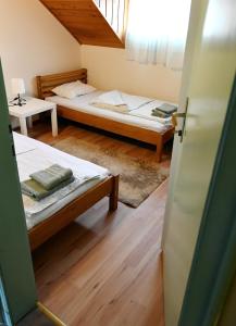 Postel nebo postele na pokoji v ubytování Smestaj SIMOVIC 2