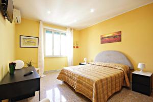 Postel nebo postele na pokoji v ubytování B&B Clelia