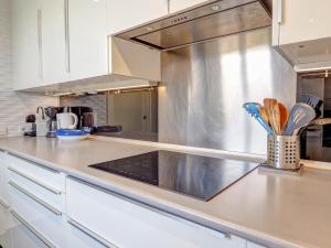 A kitchen or kitchenette at Marina Duplex by Hello Homes Sitges