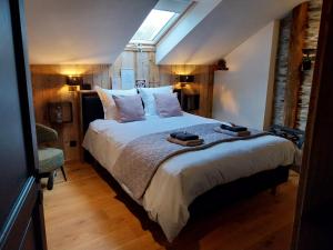 Postel nebo postele na pokoji v ubytování B&B En face du Marronnier