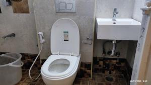 Koupelna v ubytování Magizham Homestay