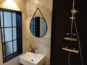 Koupelna v ubytování B&B En face du Marronnier