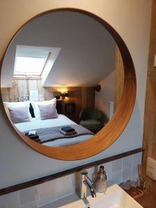 Postel nebo postele na pokoji v ubytování B&B En face du Marronnier