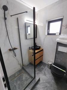 Ванна кімната в Complex Braniște
