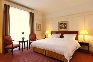Katil atau katil-katil dalam bilik di Hotel Le Plaza Brussels