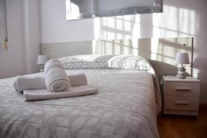 Postel nebo postele na pokoji v ubytování CASA RAICHU