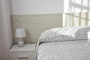 Postel nebo postele na pokoji v ubytování CASA RAICHU
