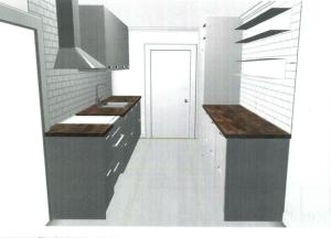 eine Küche mit schwarzen und weißen Arbeitsflächen und einer Tür in der Unterkunft The Pink House in Halmstad