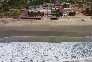 an aerial view of the beach and the ocean at Beautiful 1-Bed Room in Greater Accra Region 1 in Oshien