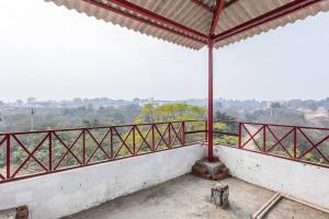 a view from the balcony of a house at MountArawaliHills in Bhundsi