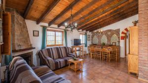 A seating area at Casa Rocio Almachar by Ruralidays