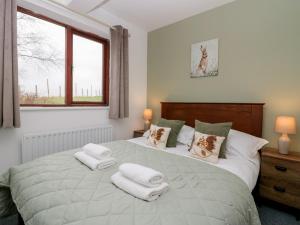 Postel nebo postele na pokoji v ubytování Winder Green