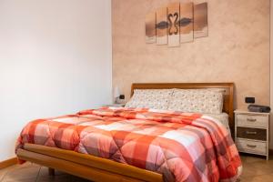 Postel nebo postele na pokoji v ubytování Casa La Corte in centro, self check in