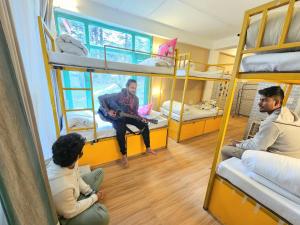 Postel nebo postele na pokoji v ubytování Safar Hostel Manali