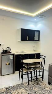 Kitchen o kitchenette sa درة الشرق للشقق المخدومة