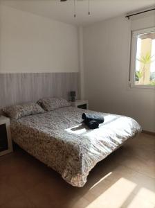 Postel nebo postele na pokoji v ubytování Apartamento con piscina y terraza con vista al mar + 12 fotografií